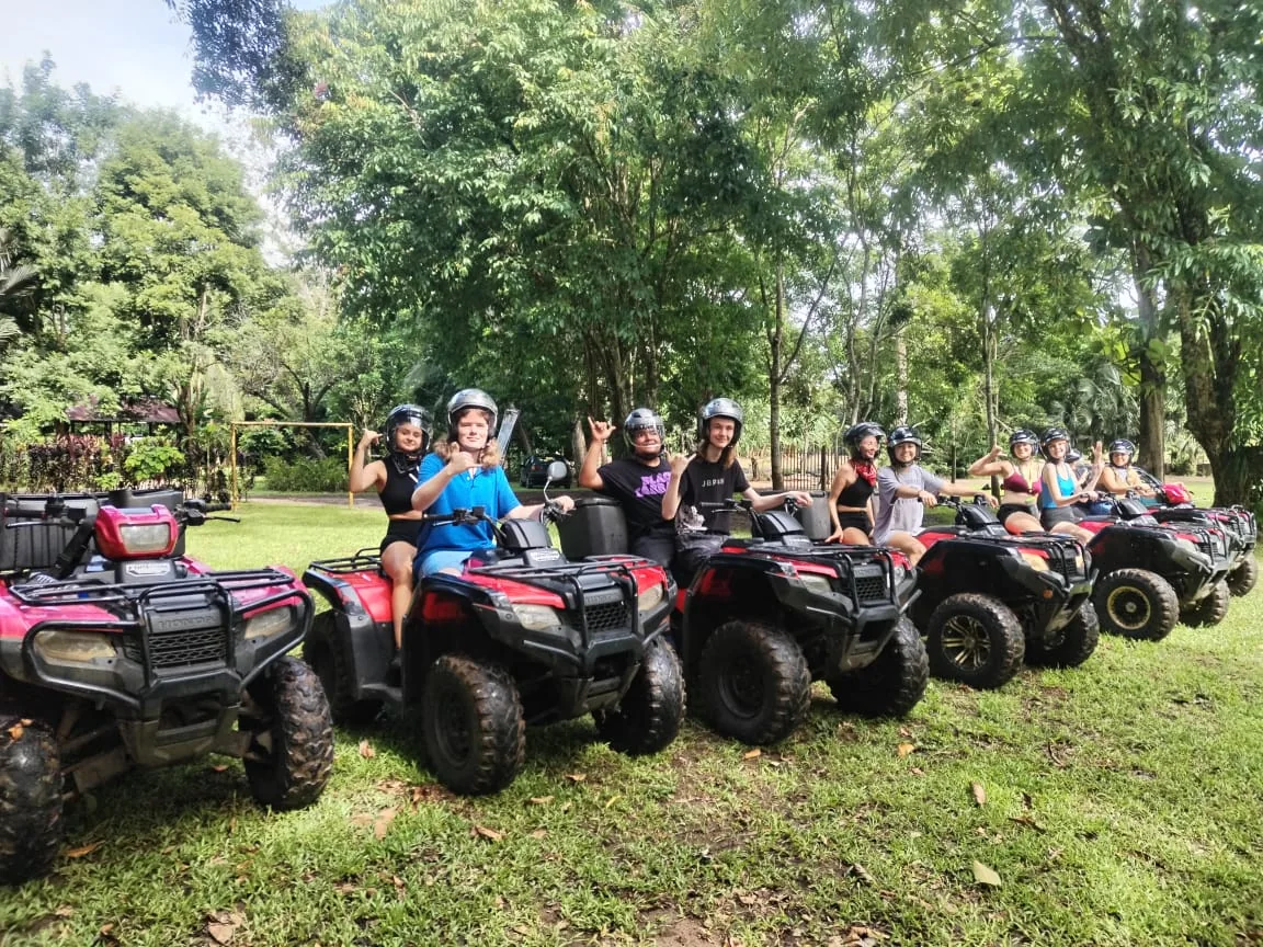Real Adventure Tours group posing with their ATVs