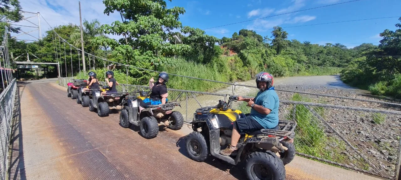 Real Adventure ATV riders crossing the river route